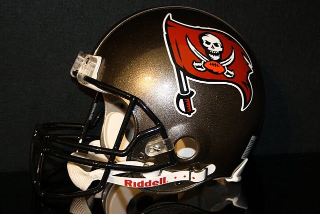 Football helmets worn by players