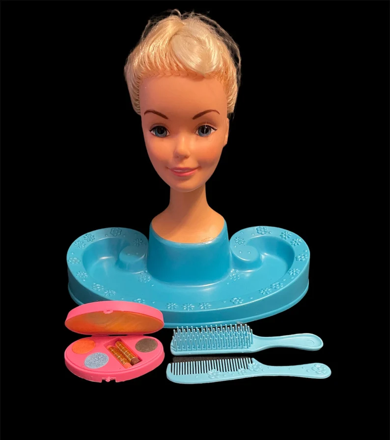 Vintage Barbie Head, a symbol of beauty ideals