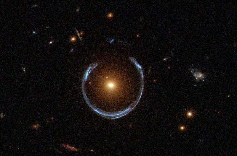 A horseshoe-shaped Einstein ring illustrating gravitational lensing